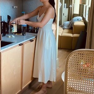 White linen dress with pockets